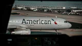 Smoking laptop prompts evacuation on American Airlines flight | Video