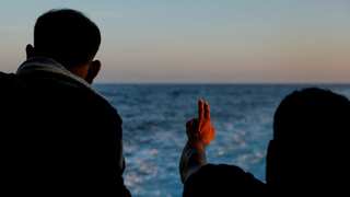 Sixty migrants feared drowned crossing Mediterranean from Libya