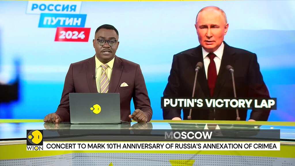 Russian President Putin greets Moscow rally after election win