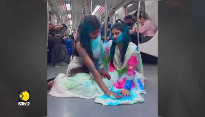 India: Video of two girls inside a metro, applying colour goes viral