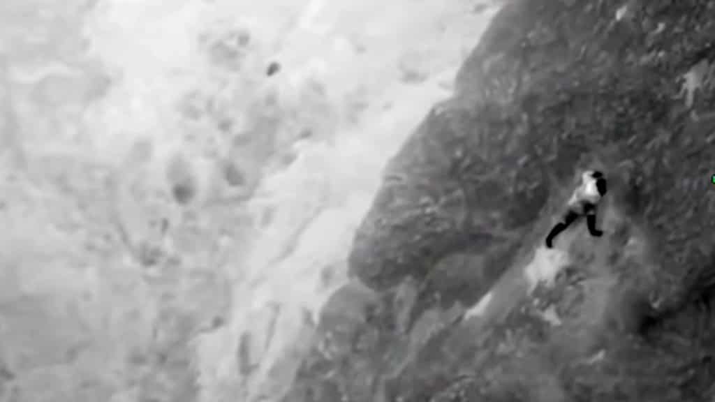 Watch: Hiker clings to rock face during daring rescue in California
