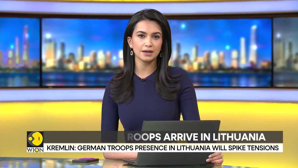 First German troops arrive in Lithuania; Kremlin issues warning