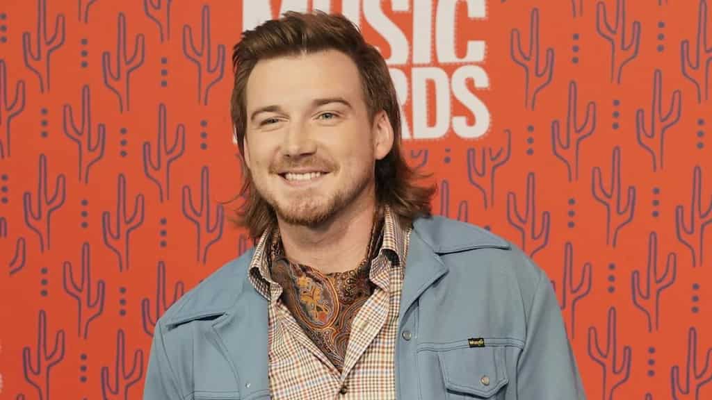 American singer Morgan Wallen throws a chair off a bar roof; gets arrested