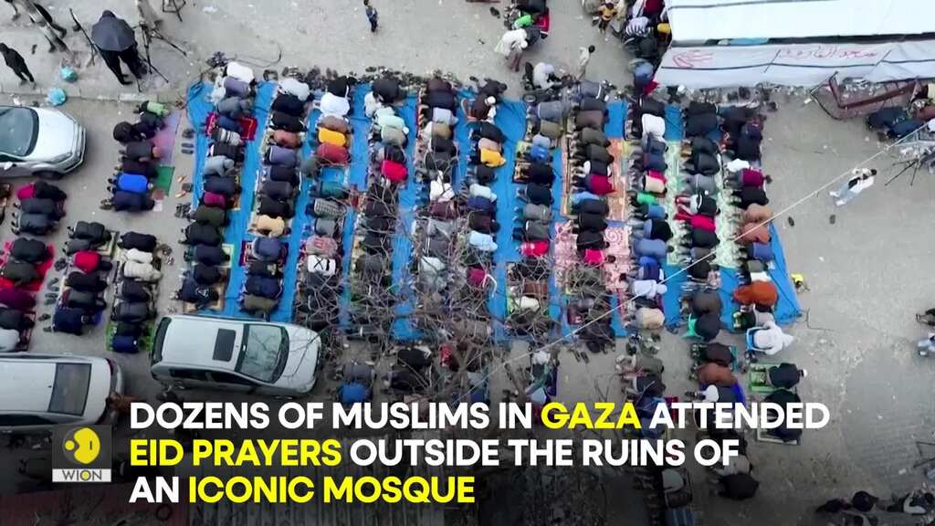 Gaza residents hold Eid prayers outside ruins of a mosque amid Israel-Hamas war