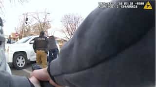 'Nothing but plain murder': Chicago police bodycam footage shows moment officers fired 96 shots at Dexter Reed