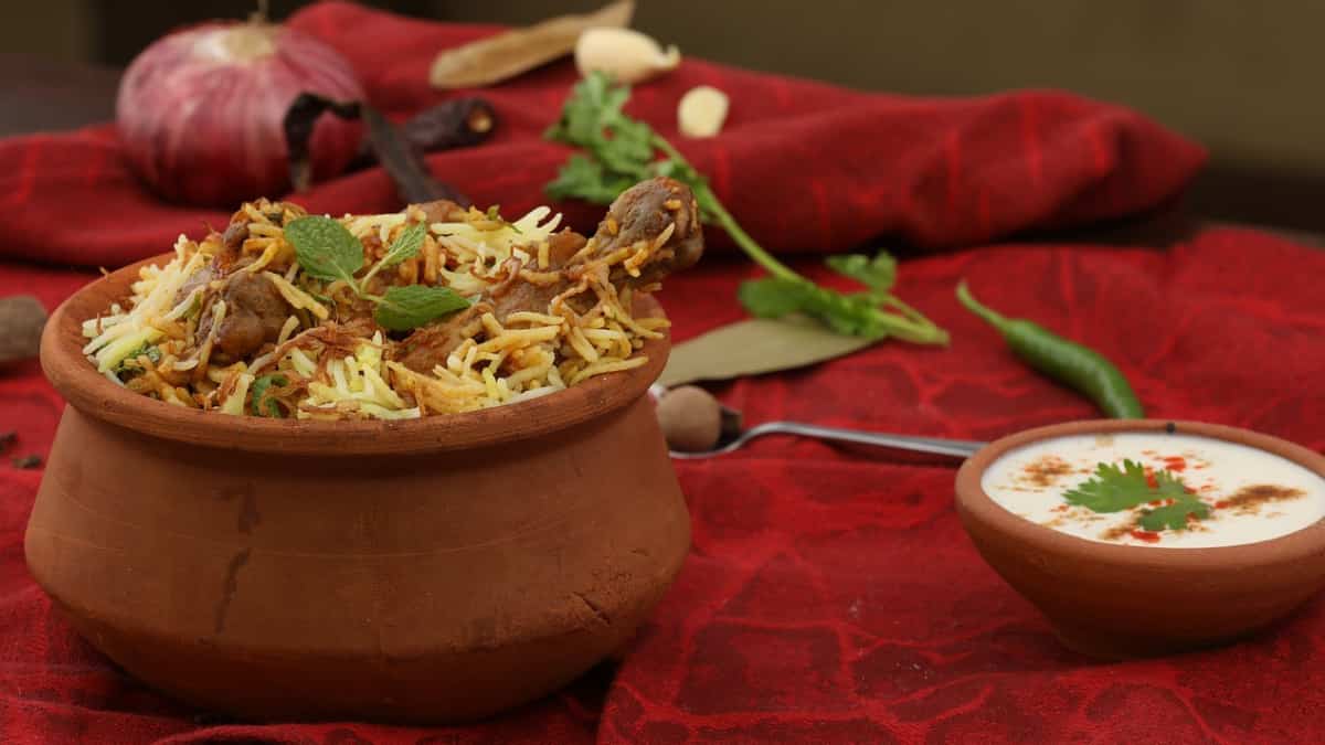 Man detained for serving biryani on disposable plates featuring Lord Ram's image Man detained for serving biryani on disposable plates featuring Lord Ram's image