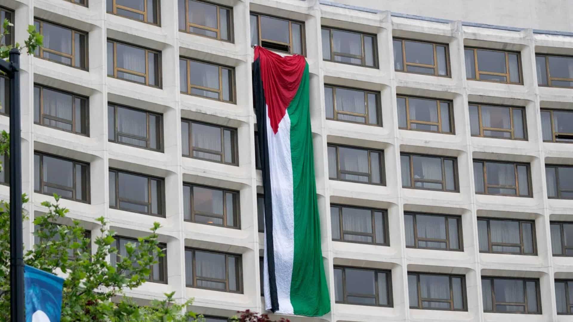 Protesters put up giant Palestinian flag at venue of Biden's White House event