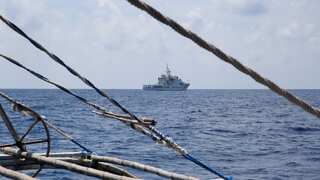 China tells Philippines to halt 'provocative actions' in South China Sea after shoal standoff