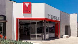 Tesla shakes up staff amid revenue decline
