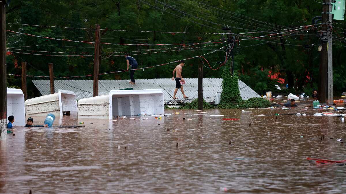 Death toll from rains in southern Brazil climbs to 29, Lula visits region Death toll from rains in southern Brazil climbs to 29, Lula visits region