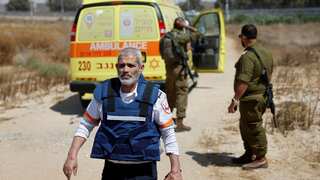 Israel shuts key border crossing for aid trucks as Hamas fires rockets