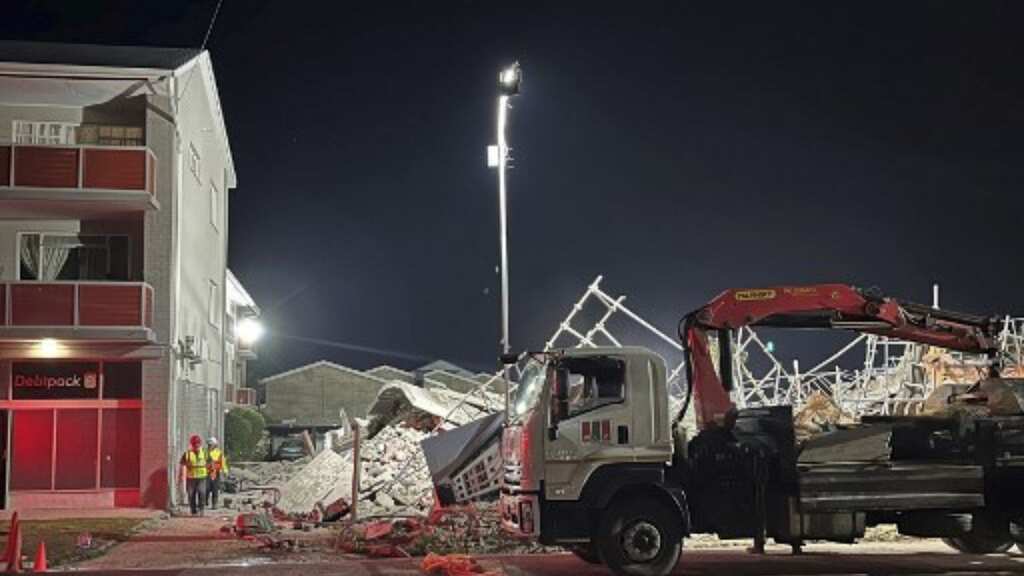 Building collapse injures 22 in South Africa, dozens still trapped
