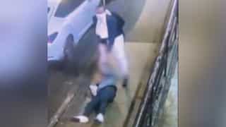 TRIGGER WARNING: Man seen choking woman with belt and pulling her between cars in New York