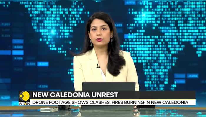 New Caledonia protesters, police spar ahead of Macron visit