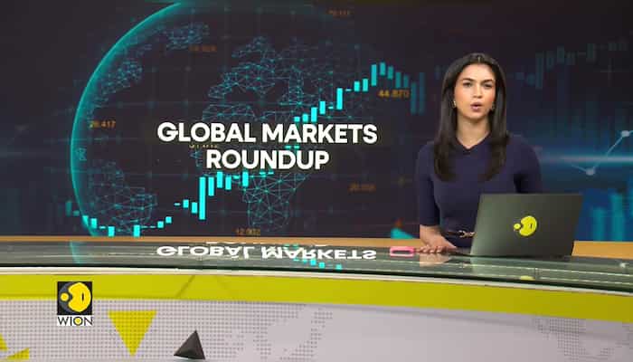 Asian stocks wobble after US hits new record high