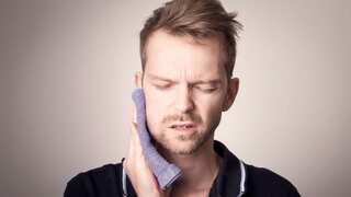 Man's eye fills with pus from flesh-eating disease caused by tooth infection. Here's what happened next