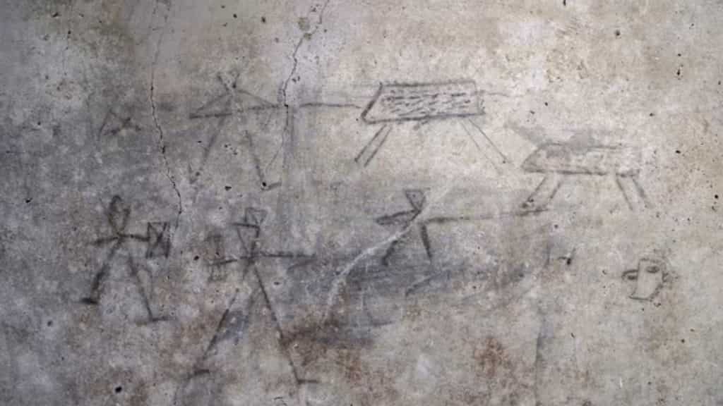 Gladiators on the wall: What charcoal graffiti tells us about the lost city of Pompeii?