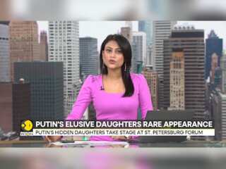 Russia: Putin's hidden daughters take stage at St.Petersburg forum