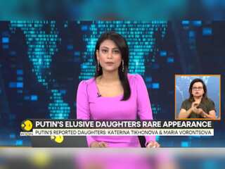 Putin rarely seen daughter breaks cover