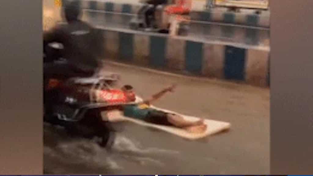 Watch: Man's mattress surfing antics on flooded Pune road go viral amid heavy rains