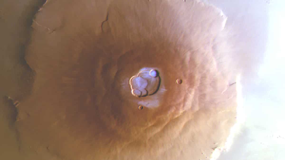 Water on Mars! Early morning frost spotted on volcanoes in breakthrough discovery Water on Mars! Early morning frost spotted on volcanoes in breakthrough discovery