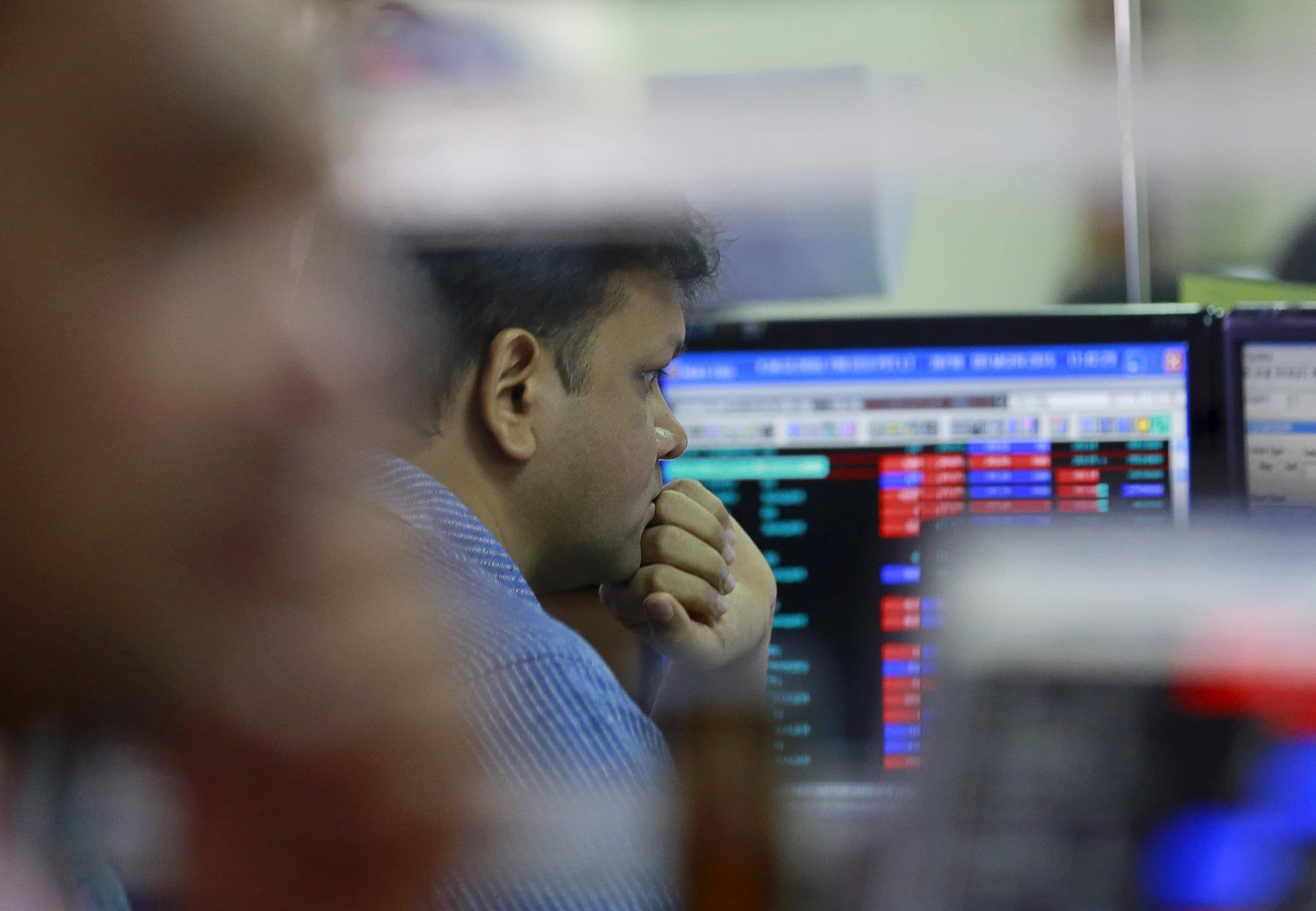 Indian shares surge to record highs on positive global cues Indian shares surge to record highs on positive global cues