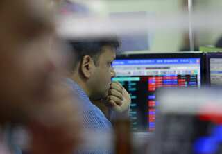 Indian shares surge to record highs on positive global cues