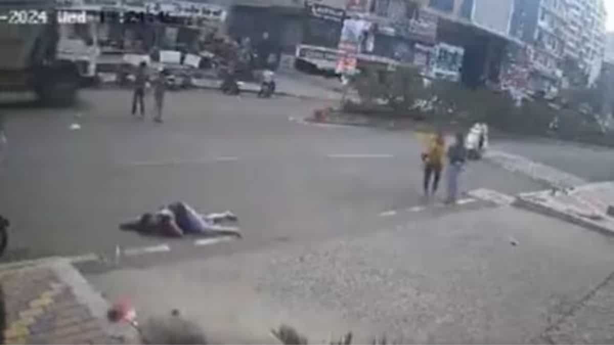 Video: Speeding car hits woman while crossing road, throws her into air ...