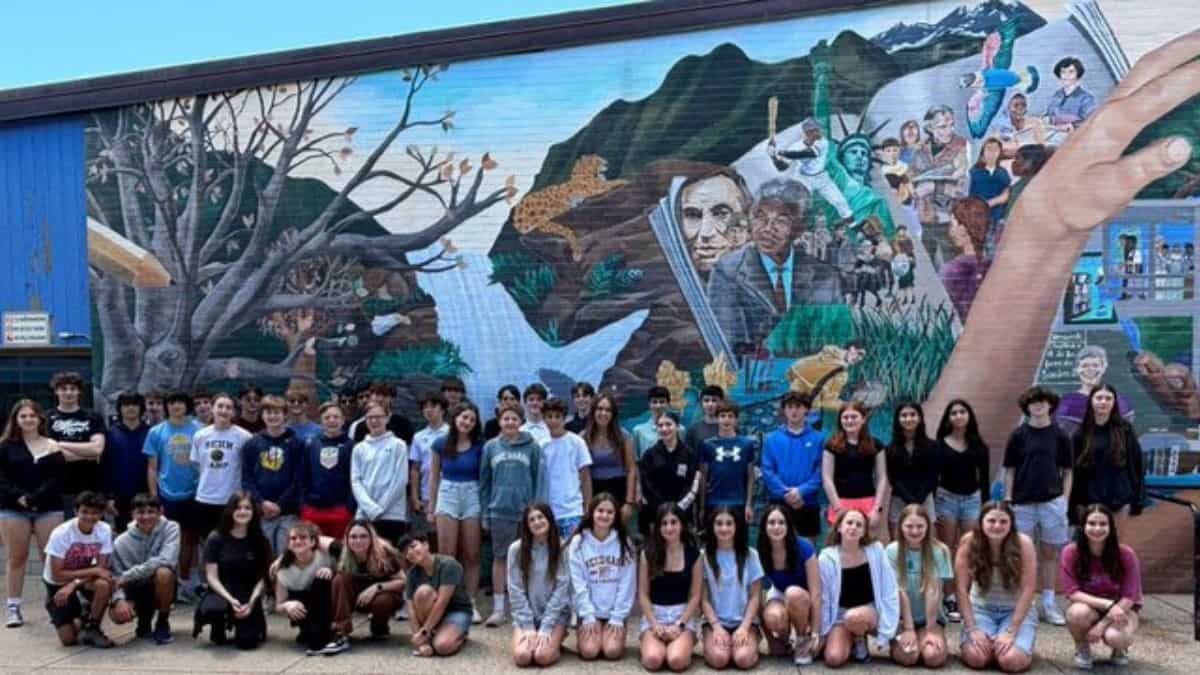 Twenty-three sets of twins graduate together from Massachusetts Middle School