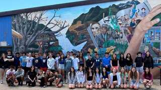 Twenty-three sets of twins graduate together from Massachusetts Middle School