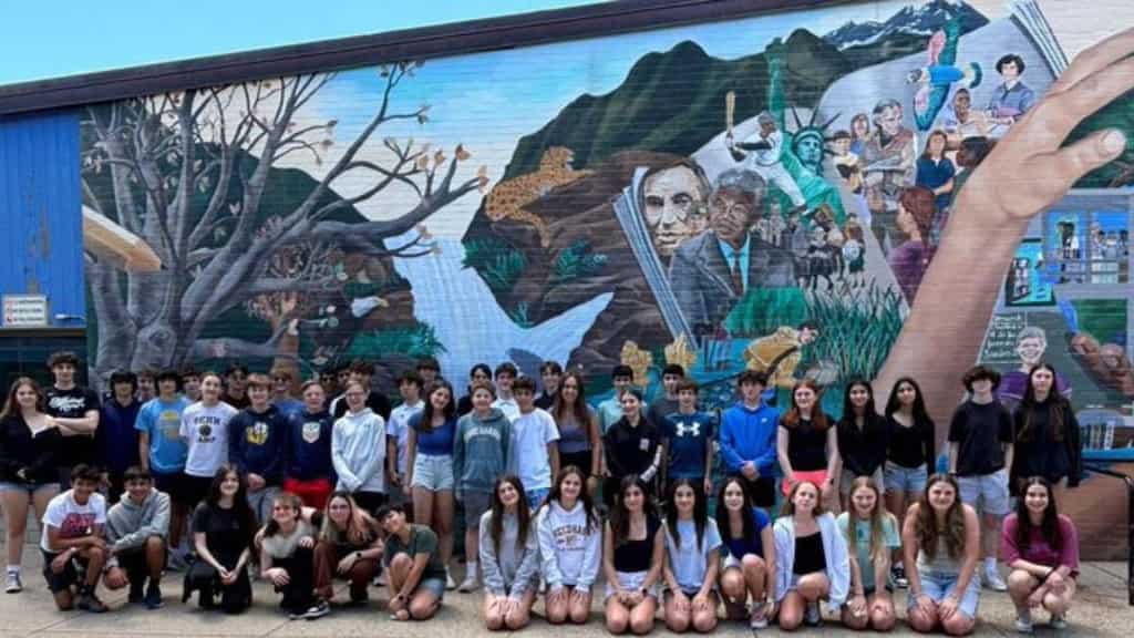Twenty-three sets of twins graduate together from Massachusetts Middle School