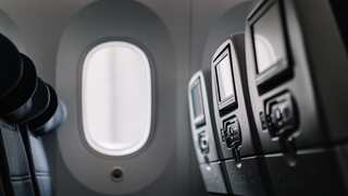 Drinking alcohol before dozing off on flights may have dire consequences. Here’s why