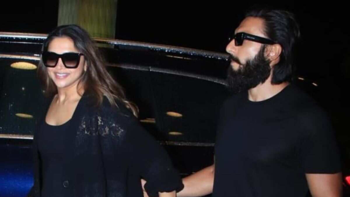 Ranveer Singh protectively holds Deepika Padukone's hand as they leave for vacation: Watch