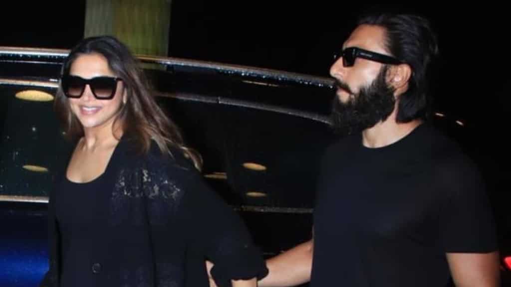 Ranveer Singh protectively holds Deepika Padukone's hand as they leave for vacation: Watch