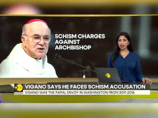 Italian archbishop says he faces Vatican trial over pope criticism