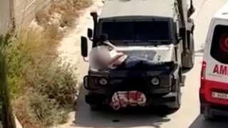 Human shield? Israeli forces strap wounded Palestinian on hood of military vehicle during West Bank raid