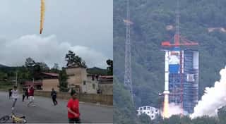 Video: People run for cover as part of Chinese rocket explodes in residential area