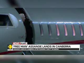 Julian Assange lands in the Australian capital after pleading guilty in Saipan