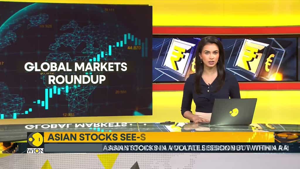 Asian stocks see-saw in a tight range