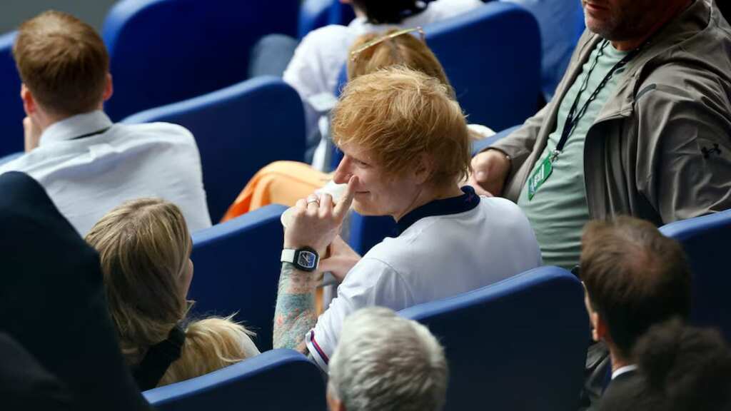 Ed Sheeran performs for England players after Slovakia win