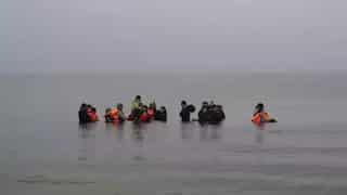 English Channel crossing: Four migrants die, dozens rescued after boat capsizes