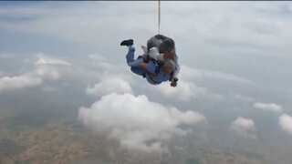 Indian minister skydives from plane to mark World Skydiving Day. Watch