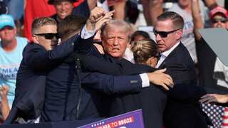 Donald Trump narrowly escapes death as gunman shoots at him during campaign rally in Pennsylvania