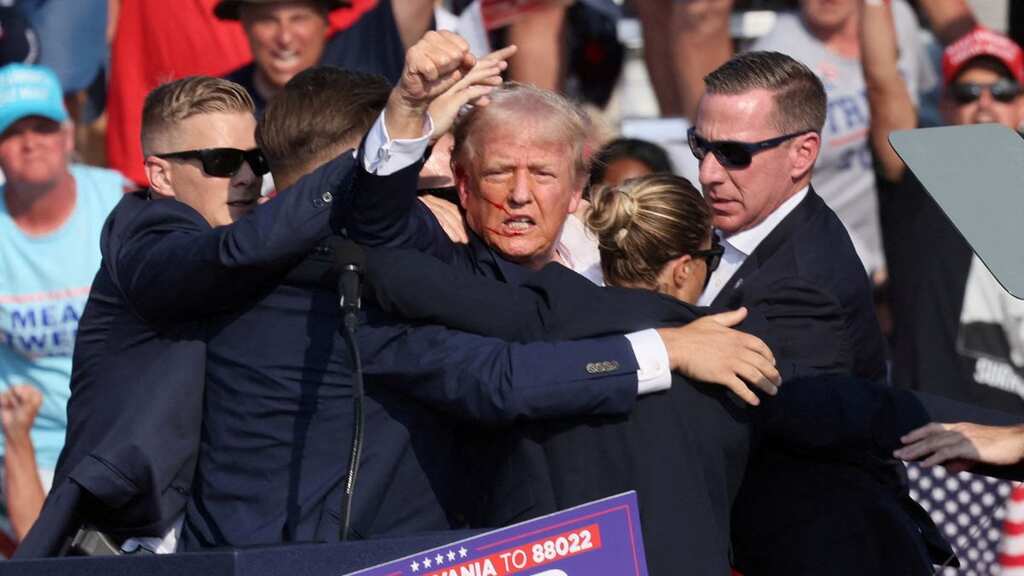 Donald Trump narrowly escapes death as gunman shoots at him during campaign rally in Pennsylvania