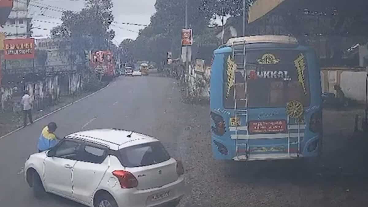 Cop drives off with petrol pump staff on bonnet after refusing to pay Cop drives off with petrol pump staff on bonnet after refusing to pay