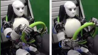 A robotic chauffeur! Scientists develop robot which can drive regular cars