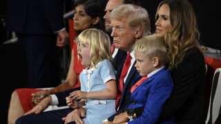 Trump the grandpa: 4-year-old Carolina sits on his lap as Luke cheers on his dad Eric at RNC
