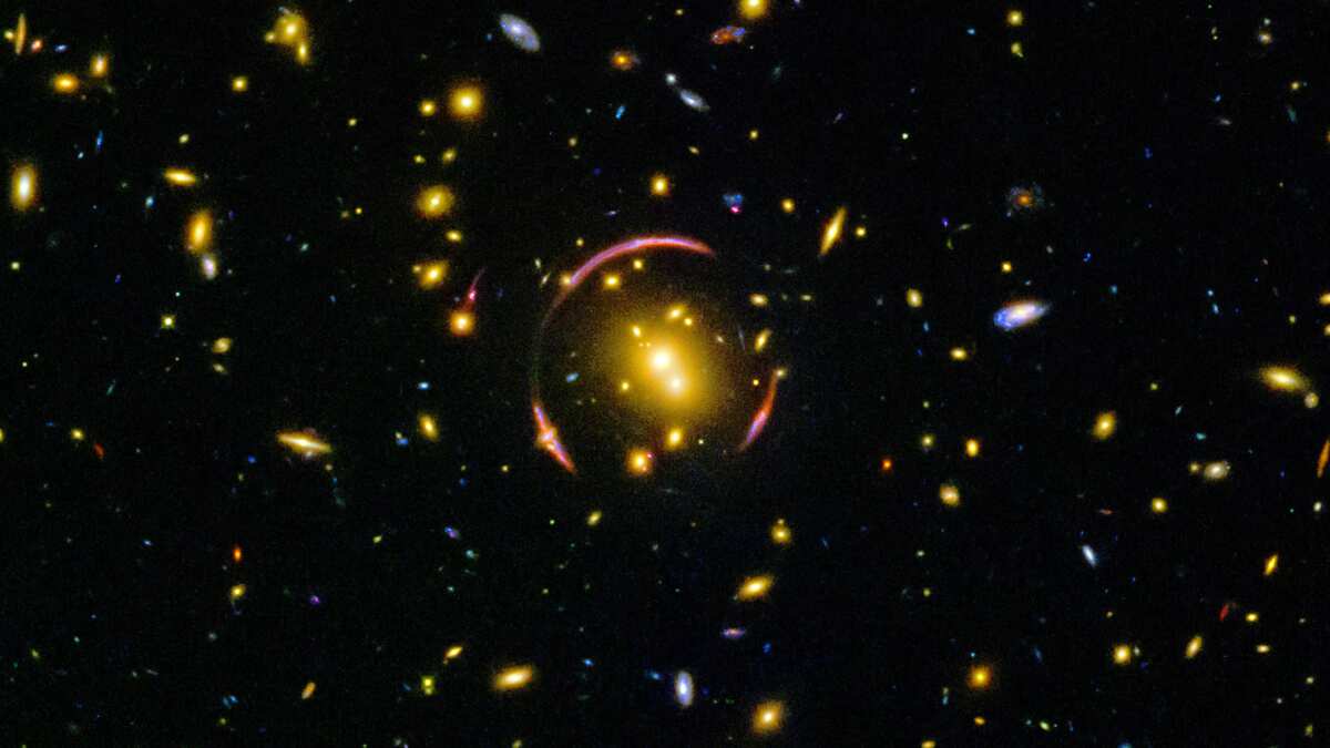 Einstein ring reveals mysteries of an intensely luminous galaxy 10 billion light years away