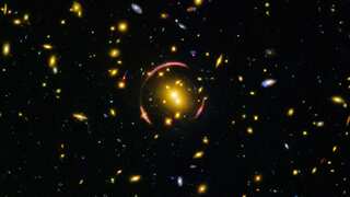 Einstein ring reveals mysteries of an intensely luminous galaxy 10 billion light years away