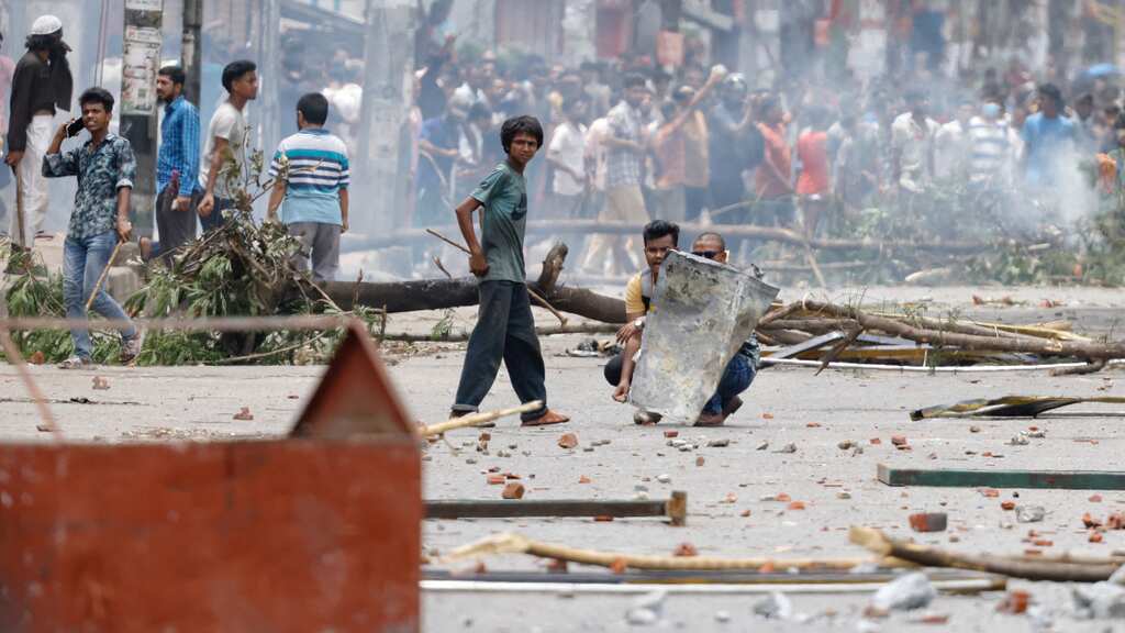 Bangladesh under curfew, blackout as over 100 killed in anti-quota protests